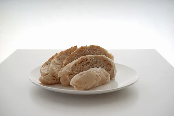 Bread served on white table — Stock Photo, Image