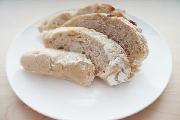 Bread served on white table — Stock Photo, Image