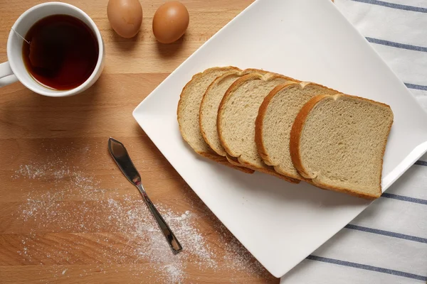 Scene from a breakfast table with staple food — Stock Photo, Image