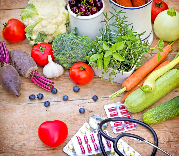 Concept of a healthy diet with supplements