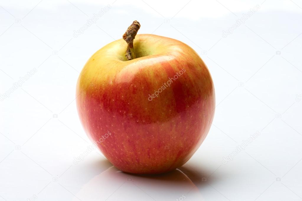 Red and yellow apple on white background