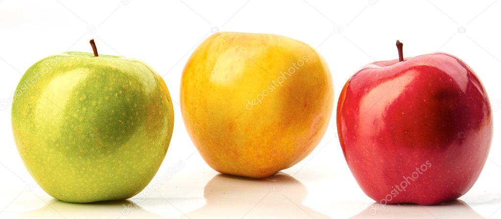 Red, green and yellow apples isolated on white