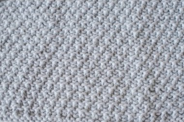 Yaratıcı desenli açık mavi ekose örgü. Yakın çekim.