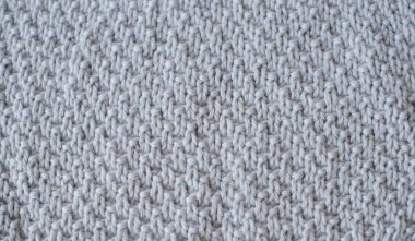 Yaratıcı desenli açık mavi ekose örgü. Yakın çekim.