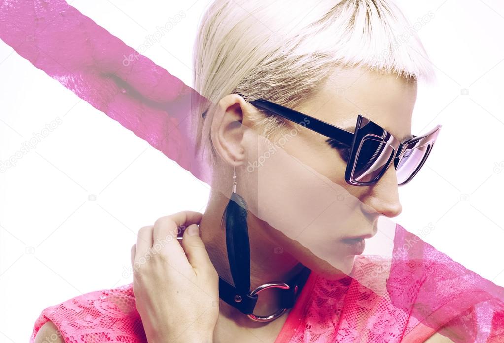 Stylish blond girl in fashionable sunglasses and jewelry. Be in 