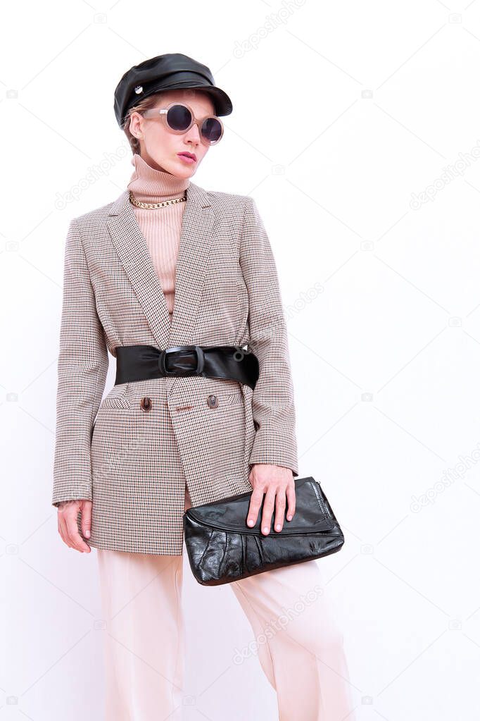 Paris Girl. Details of everyday look. Casual beige outfit and accessories. Trendy Minimalistic style. Total Beige retro aesthetics. Fashion fall winter spring look book.