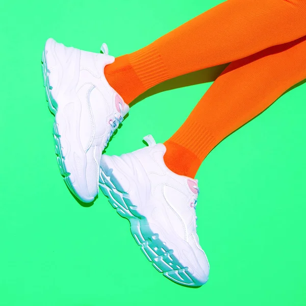 Stylish White Sneakers Vintage Orange Stockings Fresh Green Background Sport — Stock Photo, Image