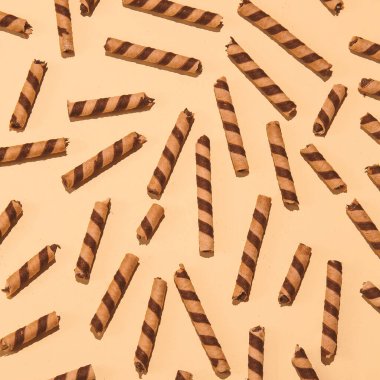 Çikolatalı kurabiye waffle rulo arka plan. Şekersever konsepti. En az sanat eseri. Tatil zamanı parti zamanı, kış Noel kutlaması mevsimi düzdü
