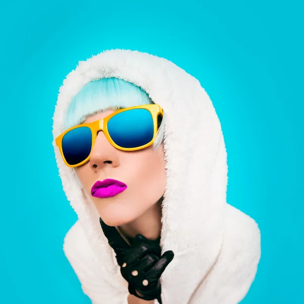 Positive girl on bright blue background. winter Style — Stock Photo, Image