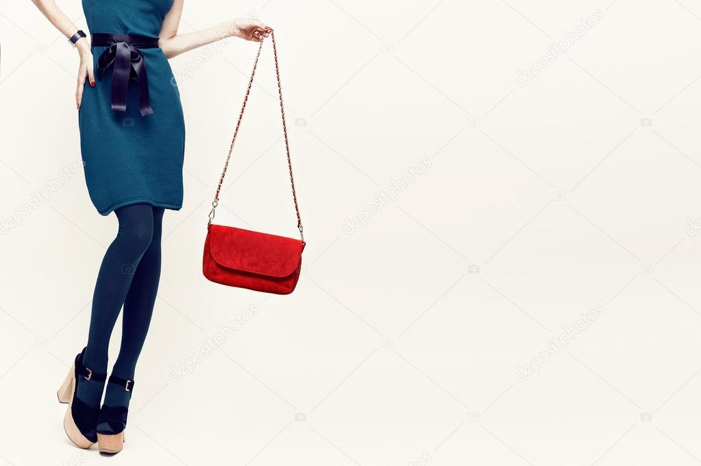 Glamorous lady in vintage trend accessories. Green and red combi