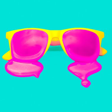 Exclusive yellow hipster sunglasses on blue background. dripping clipart