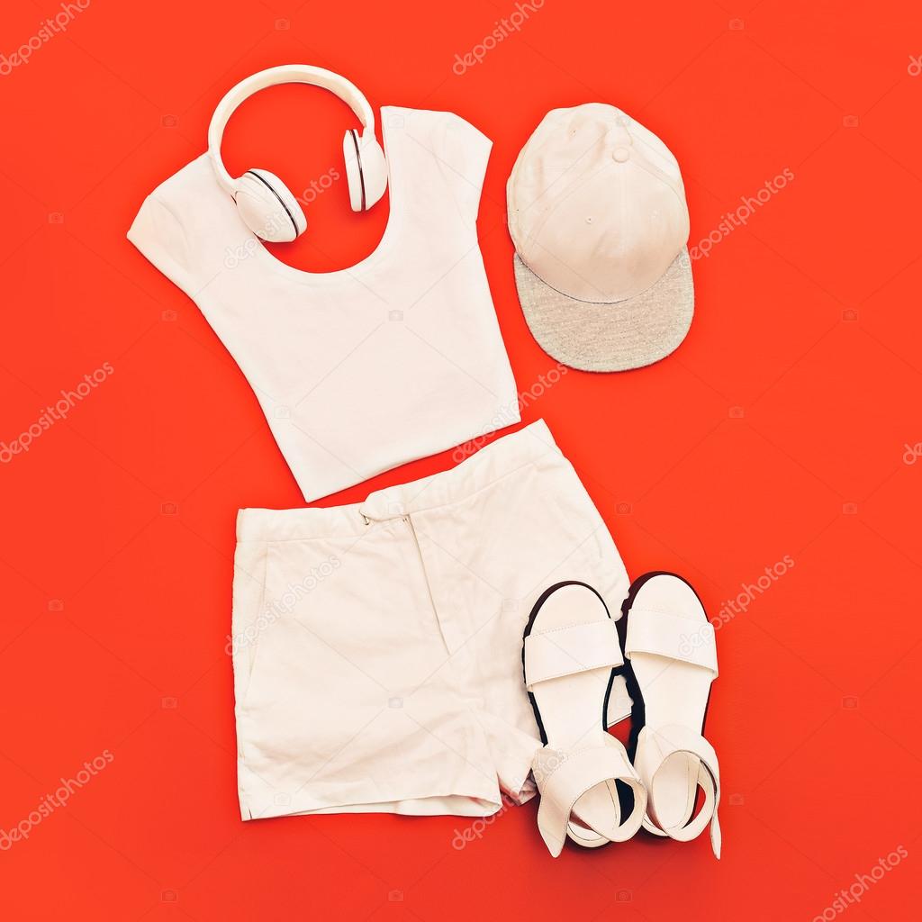 white set. White clothes and accessories on bright pink backgrou