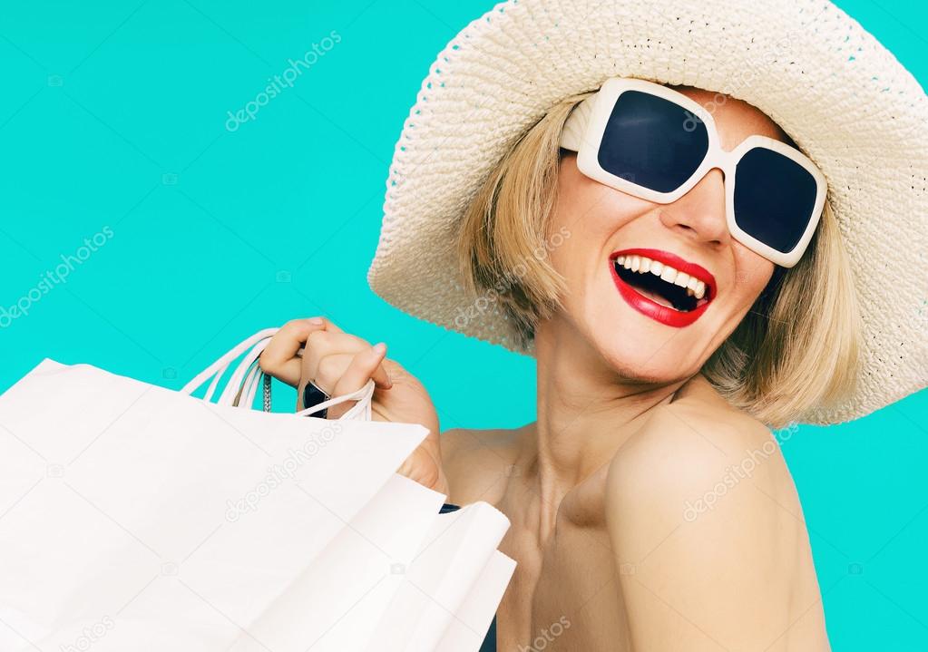 Happy shopping summer lady on blue background