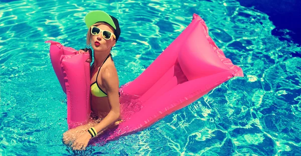 Glamour girl with inflatable mattress in the pool hot summer par — Stok fotoğraf