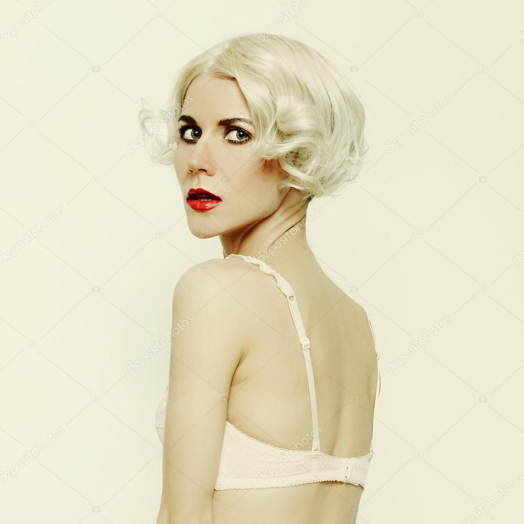 Sensual blond model in retro style