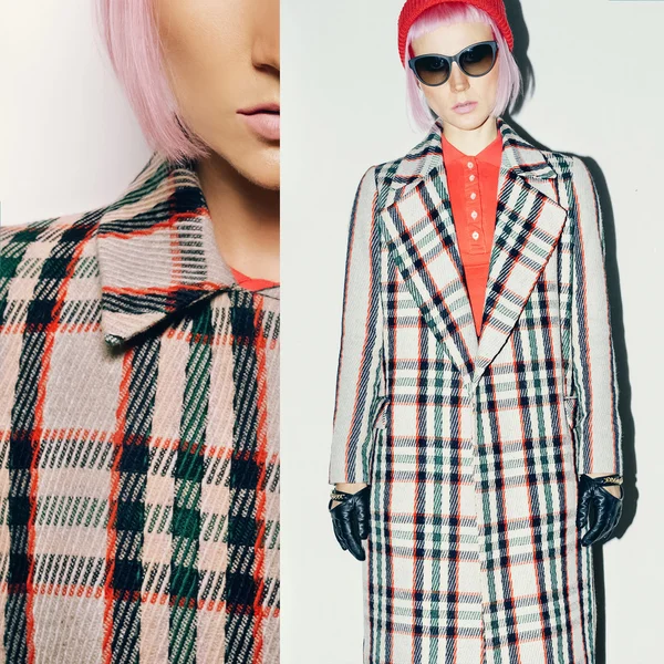 Fashion model in red hat and checkered coat. Latest trend style — Stock Photo, Image