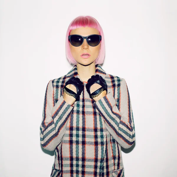 Fashionable Lady in checkered coat and pink hair — Stock Photo, Image