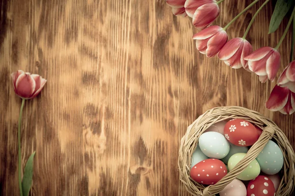 Easter eggs on wooden table — Stock Photo, Image