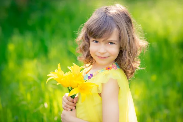 Child in spring park — Stock Photo, Image