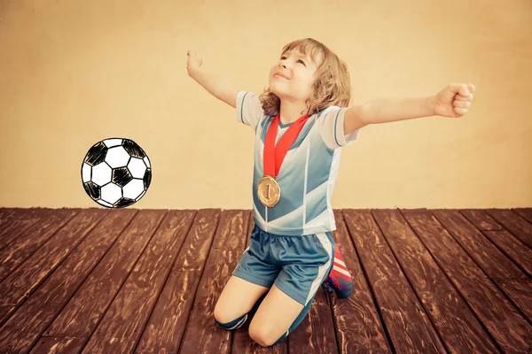 Child is pretending to be a soccer player — Stock Photo, Image