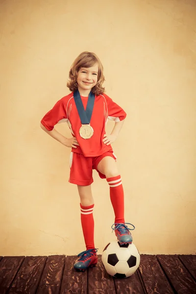 Child is pretending to be a soccer player — Stock Photo, Image