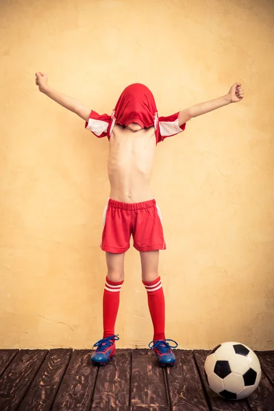 Child is pretending to be a soccer player — Stock Photo, Image