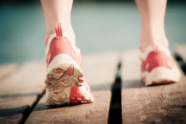 Feet of jogging woman — Stock Photo, Image