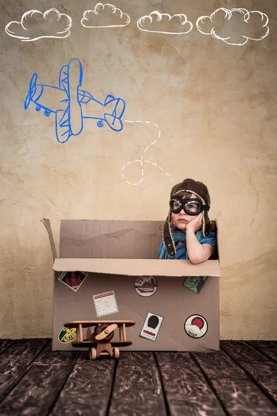 Child is pretending to be a pilot — Stock Photo, Image