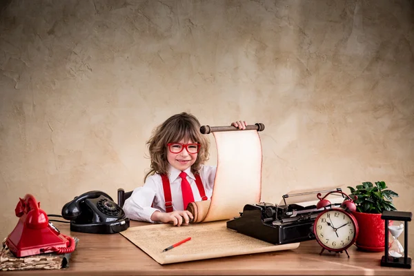 Empresário infantil no cargo — Fotografia de Stock