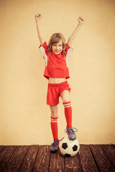 Child is pretending to be a soccer player — Stock Photo, Image