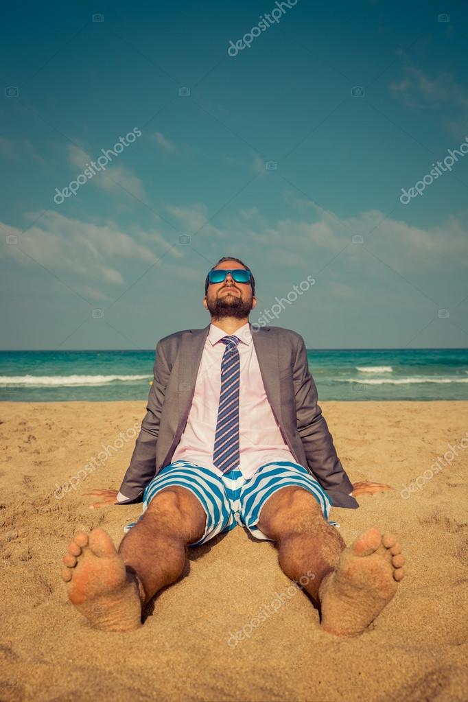 Funny businessman on beach Stock Photo by ©Yaruta 106005576 Funny businessman on beach Stock Photo by ©Yaruta 106005576