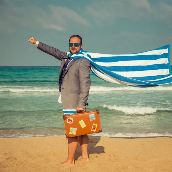 Grappige zakenman op strand — Stockfoto