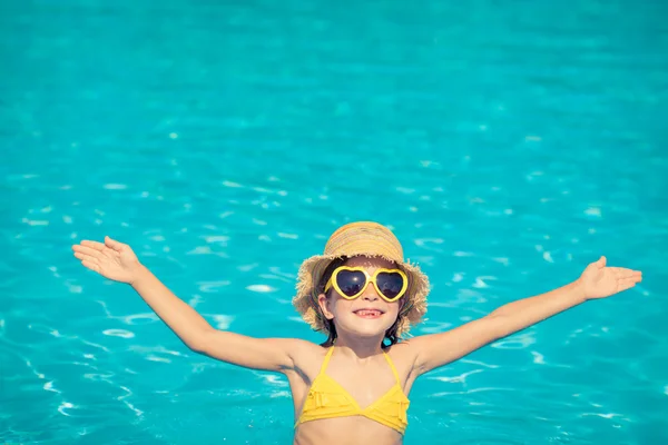 Child in swimming pool Royalty Free Stock Photos