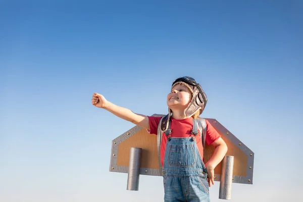 Niño Feliz Jugando Con Alas Juguete Contra Fondo Azul Del — Foto de Stock