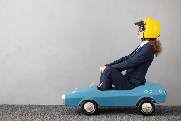 Successfull Businesswoman Driving Toy Car Outdoor Funny Young Woman Concrete — Stock Photo, Image