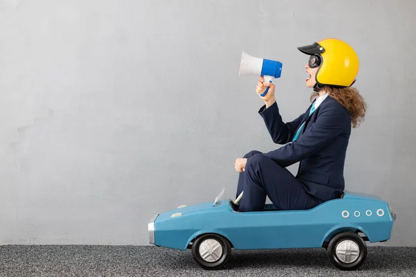 Successfull Businesswoman Driving Toy Car Outdoor Funny Young Woman Shouting — Stock Photo, Image