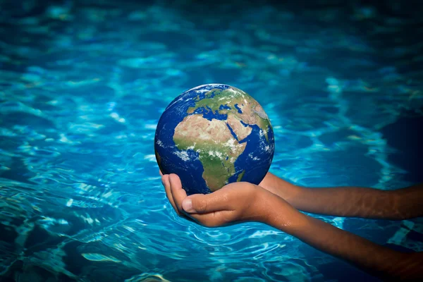 Child holding Earth planet — Stock Photo, Image