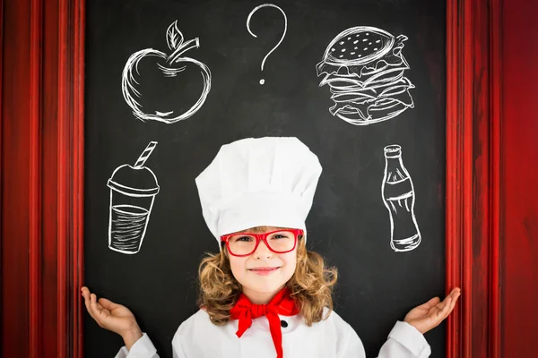 Child chef cook. Restaurant business concept