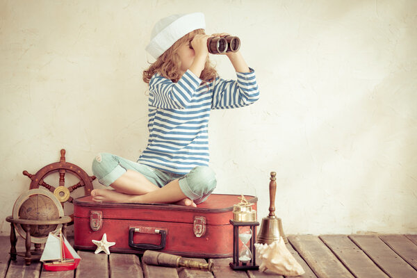 Girl looking through the binoculars