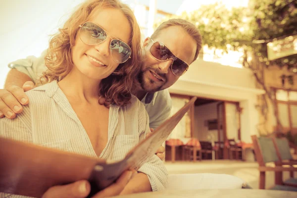 Young couple in summer cafe — Stock Photo, Image