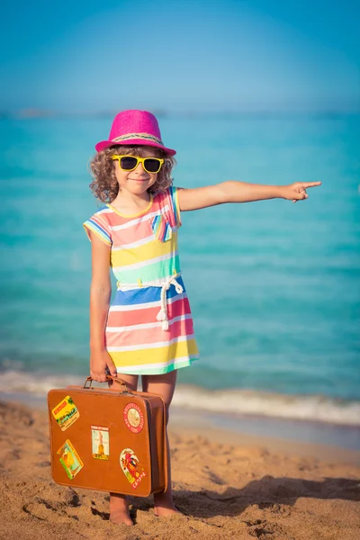 Traveller child with vintage suitcase — Stock Photo, Image