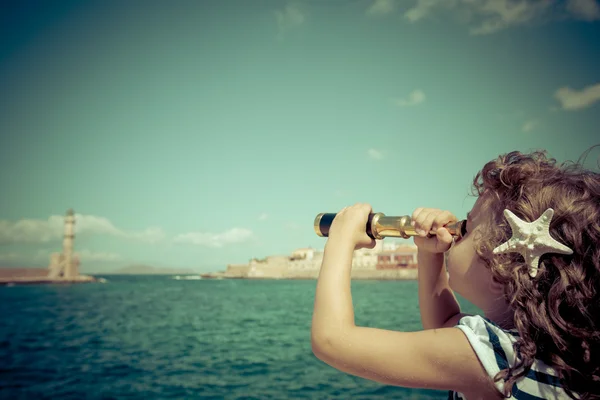 Sailor kid looking through the binoculars — Stock Photo, Image