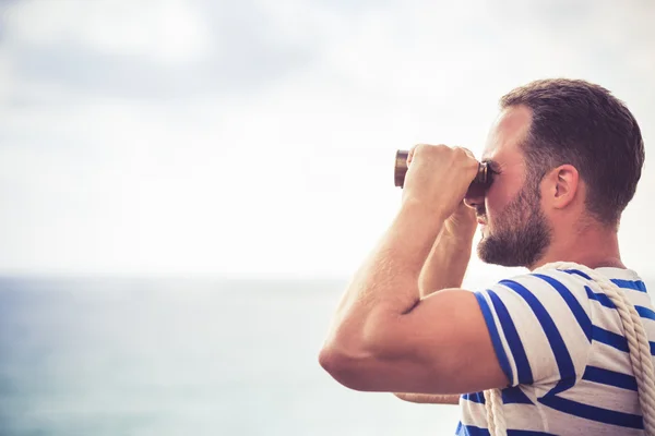 Sailor man looking through the binoculars — Stock Photo, Image