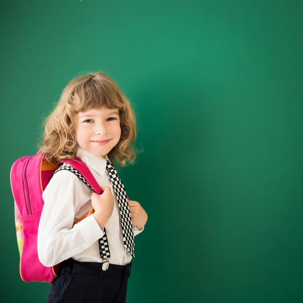 Schooljong geitje met een rugzak — Stockfoto