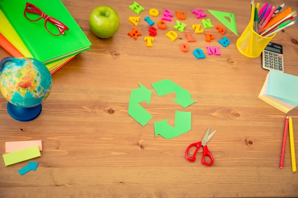 School items on wooden desk — Stock Photo, Image