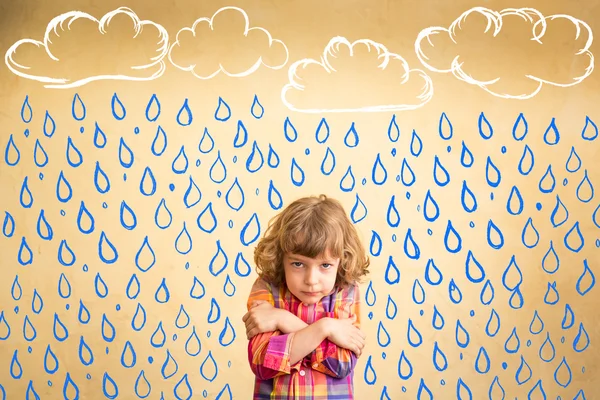 Funny kid  under painted  rain — Stock Photo, Image
