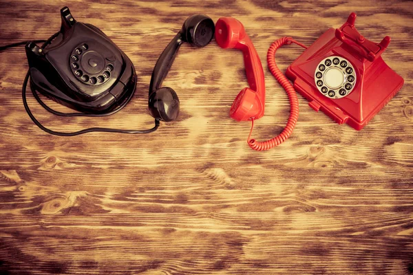 Retro black and red phones — Stock Photo, Image