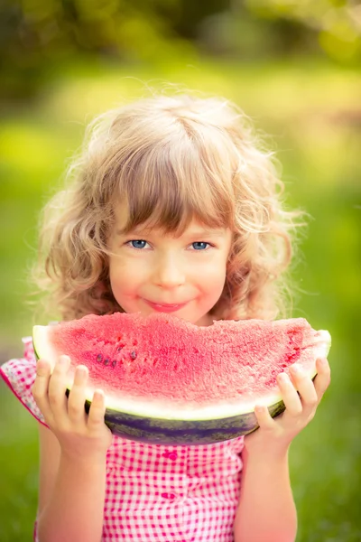 Child eating watermelon — Stock Photo, Image