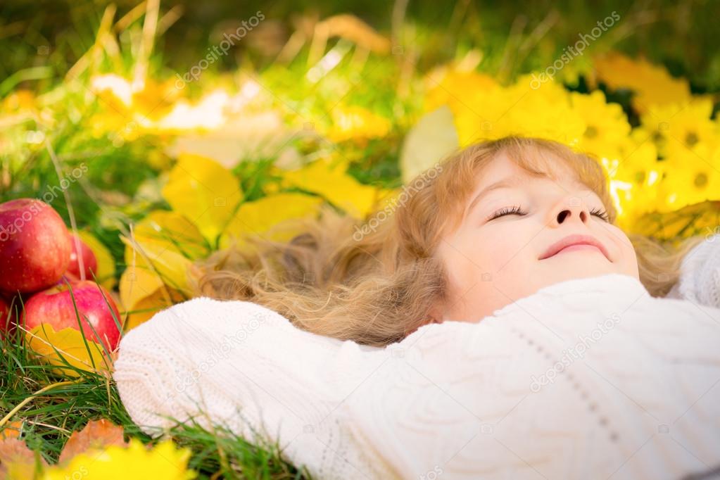 Child in autumn park