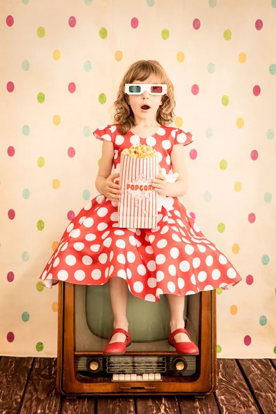 Funny girl holding popcorn — Stock Photo, Image